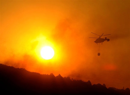 Wildfires in Spain - from Agence France Presse extreme weather found across the world
