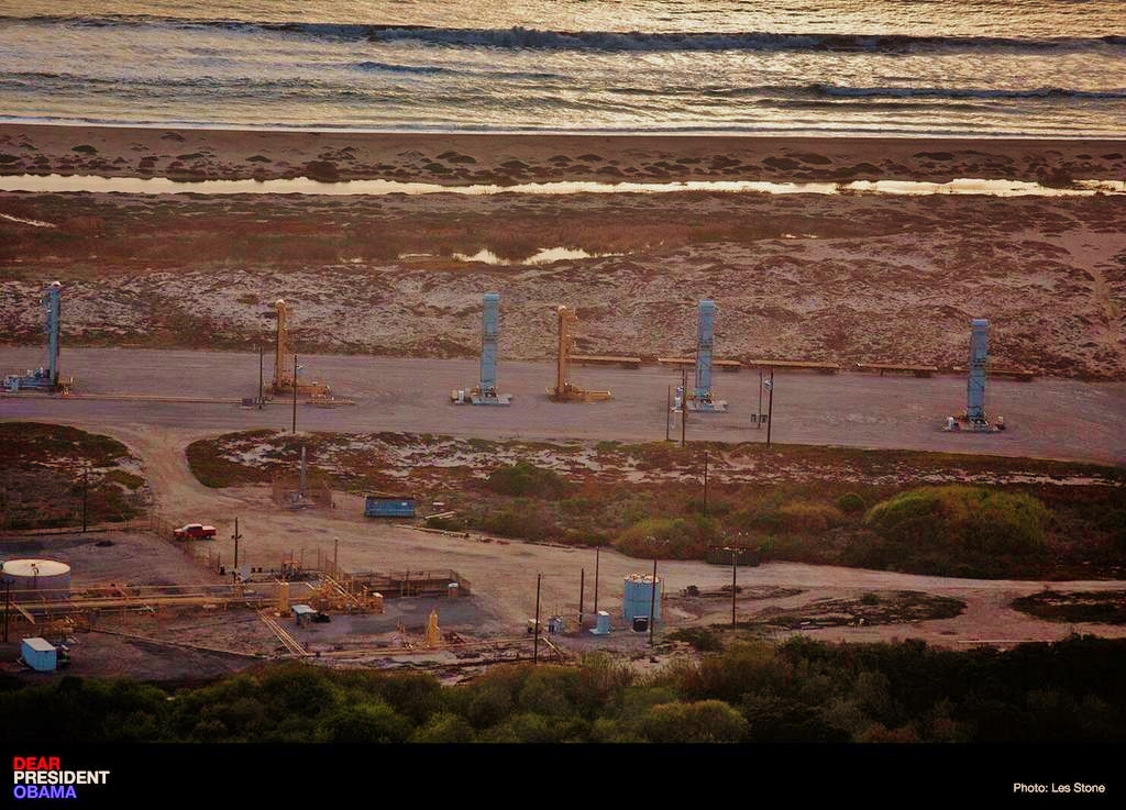 Fracking and extreme oil well stimulation techniques, close to the ocean, streams and underground aquifers, close to homes and agricultural fields, endangers people, water supply, and air quality, as well as increases the chances of earthquakes. Photo of drilling near Oxnard, CA, by Les Stone.
